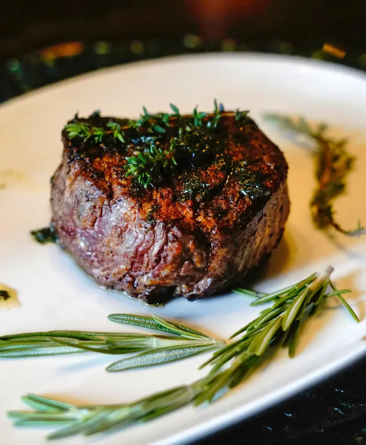 Marble Room Steaks and Raw Bar signature dishes Filet Mignon, Rib-Eye, Cheesecake